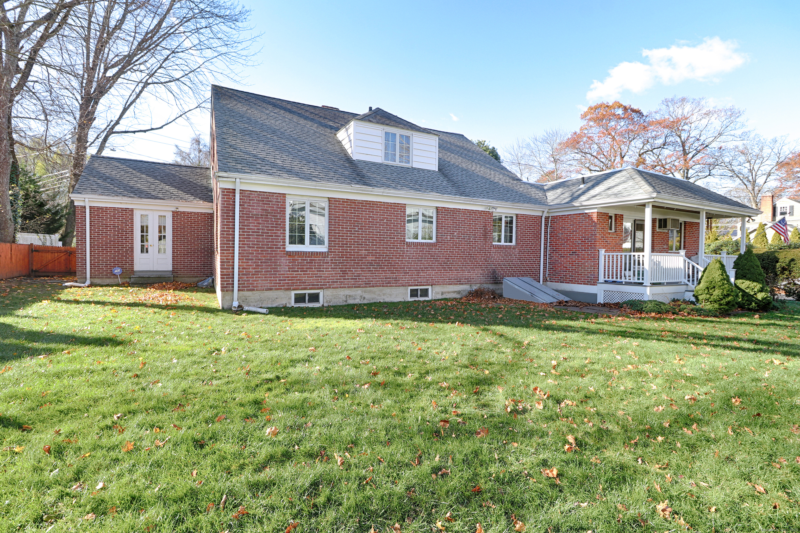 232 Church Hill Road Fairfield, CT 06825 - Photo 2 of 31 a front view of house with yard and green space