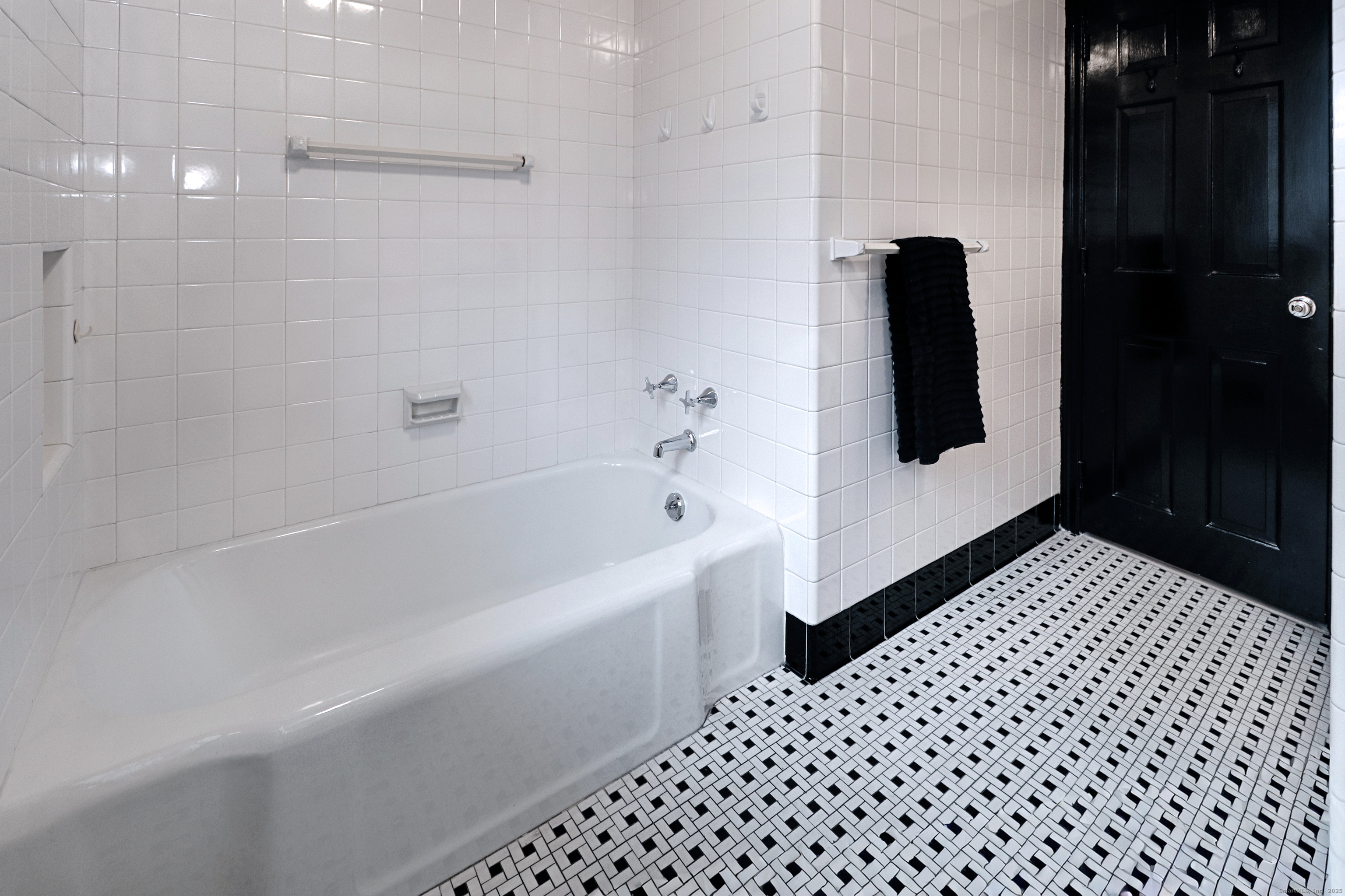 232 Church Hill Road Fairfield, CT 06825 - Photo 21 of 31 a bathroom with a bathtub and shower