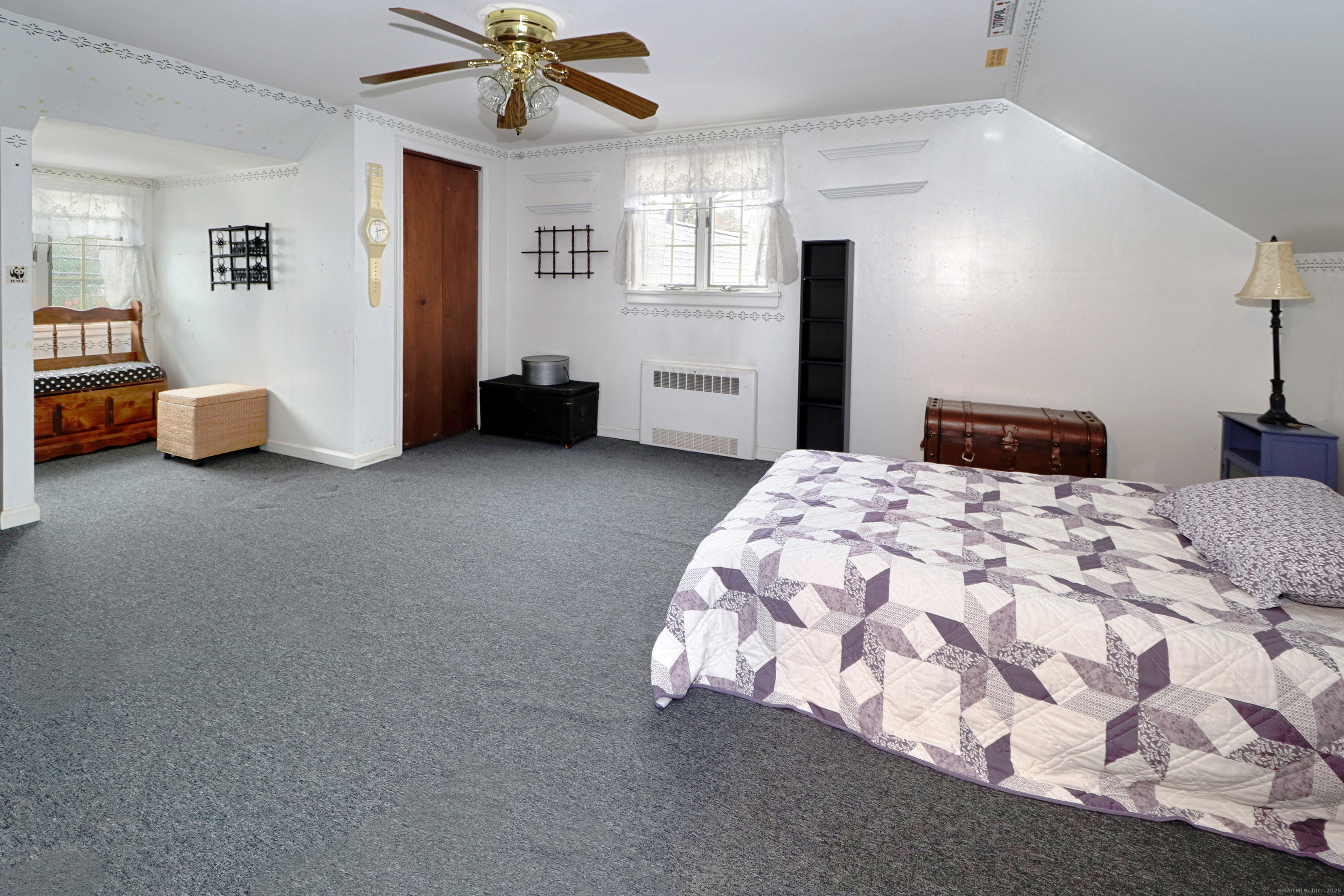 232 Church Hill Road Fairfield, CT 06825 - Photo 23 of 31 a bedroom with bed and window