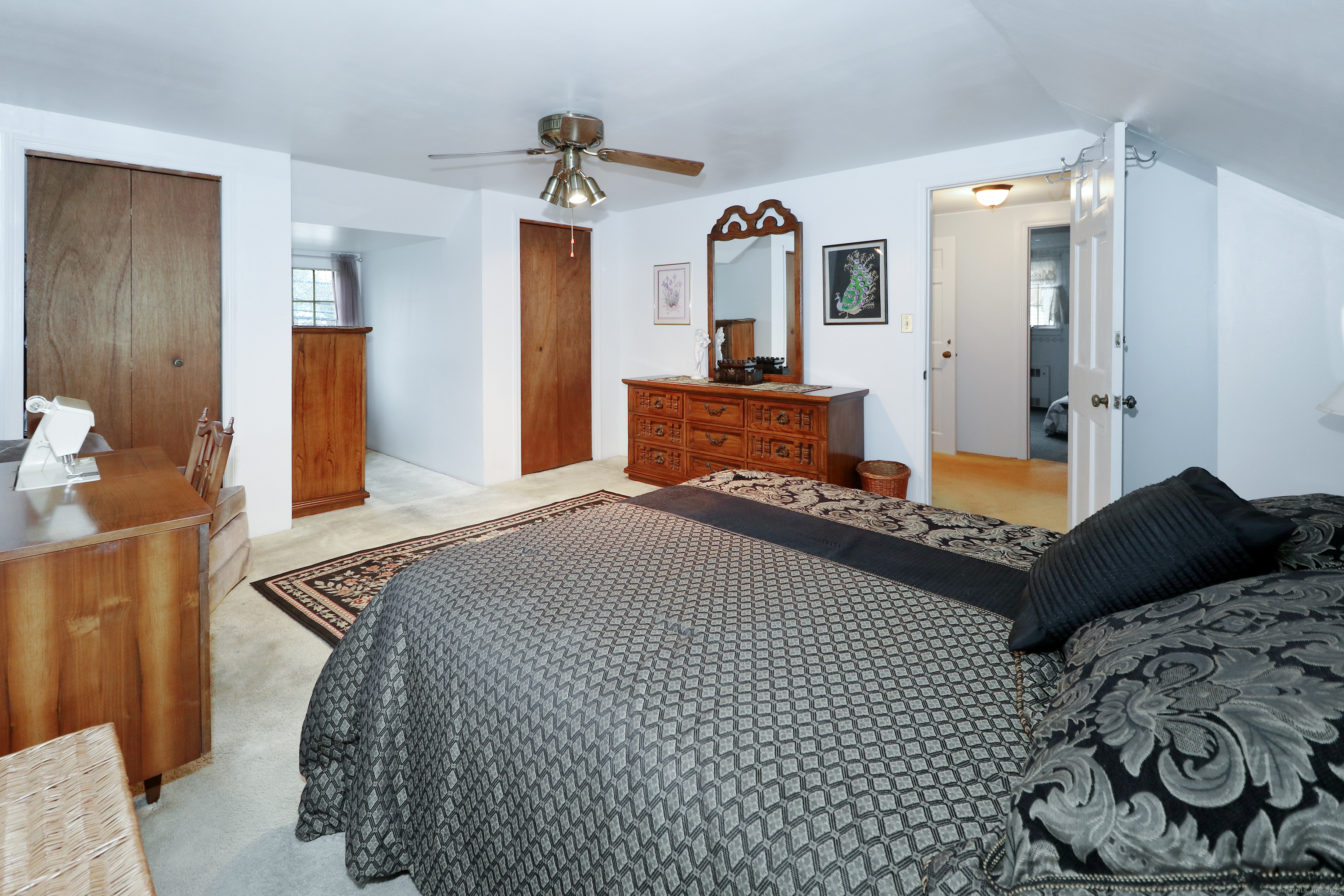 232 Church Hill Road Fairfield, CT 06825 - Photo 25 of 31 a bedroom with bed and a window