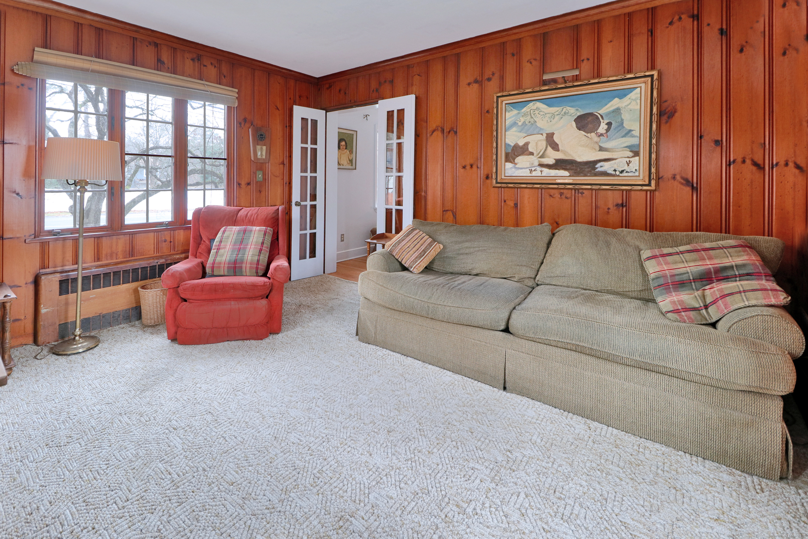 232 Church Hill Road Fairfield, CT 06825 - Photo 7 of 31 a living room with furniture and a large window