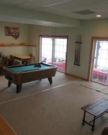 19 Sandy Beach Road Holland, MA 01521 - Photo 22 of 28 a room with pool table and windows