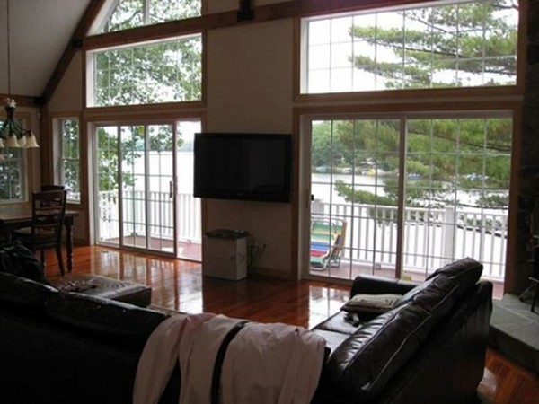19 Sandy Beach Road Holland, MA 01521 - Photo 4 of 28 a living room with furniture tv and a window