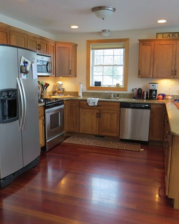 19 Sandy Beach Road Holland, MA 01521 - Photo 6 of 28 a kitchen with granite countertop a refrigerator stove top oven and sink