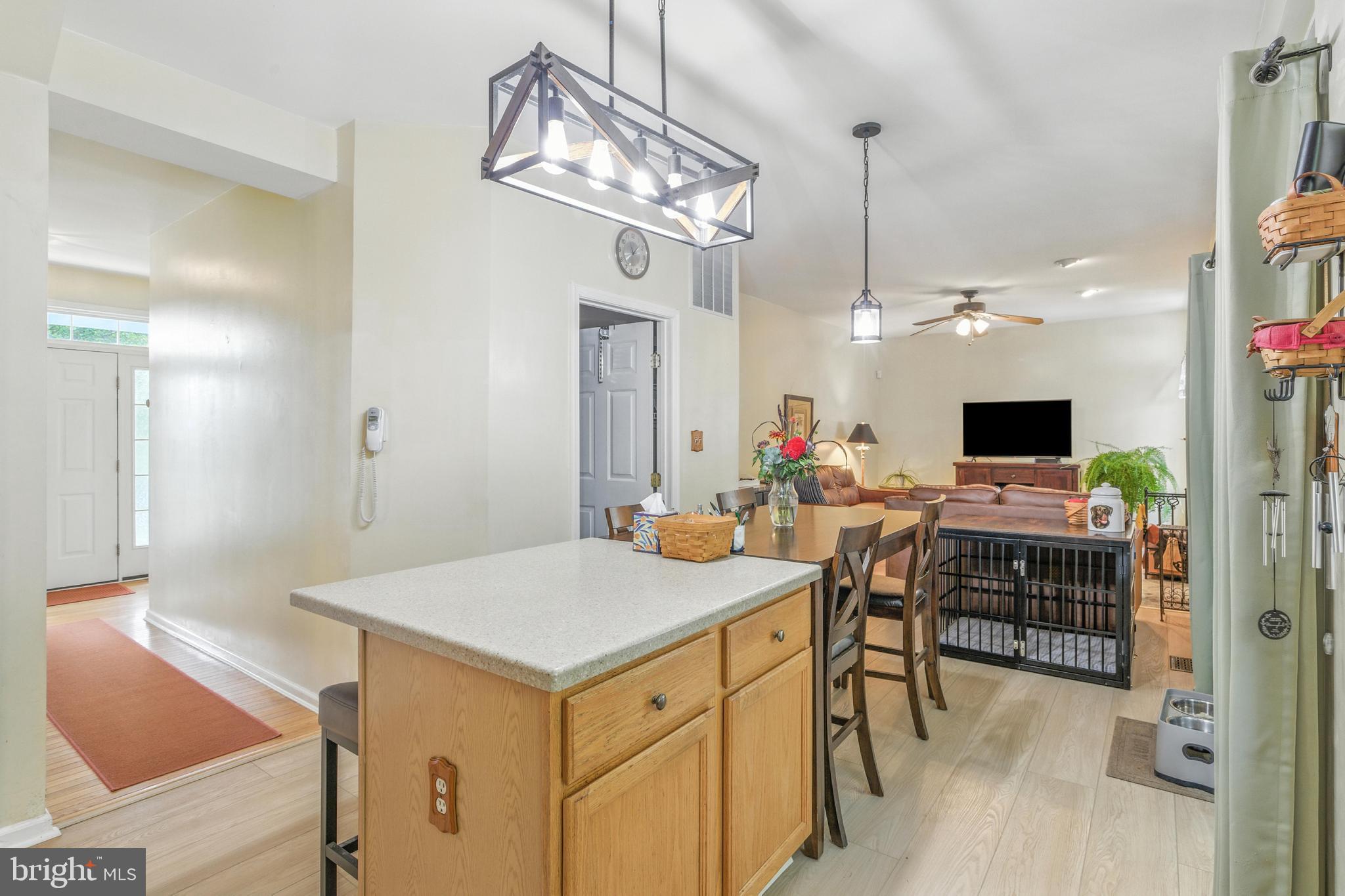 463 Preakness Run Newark, DE 19702 - Photo 12 of 32 a view of a dining room with furniture and a chandelier