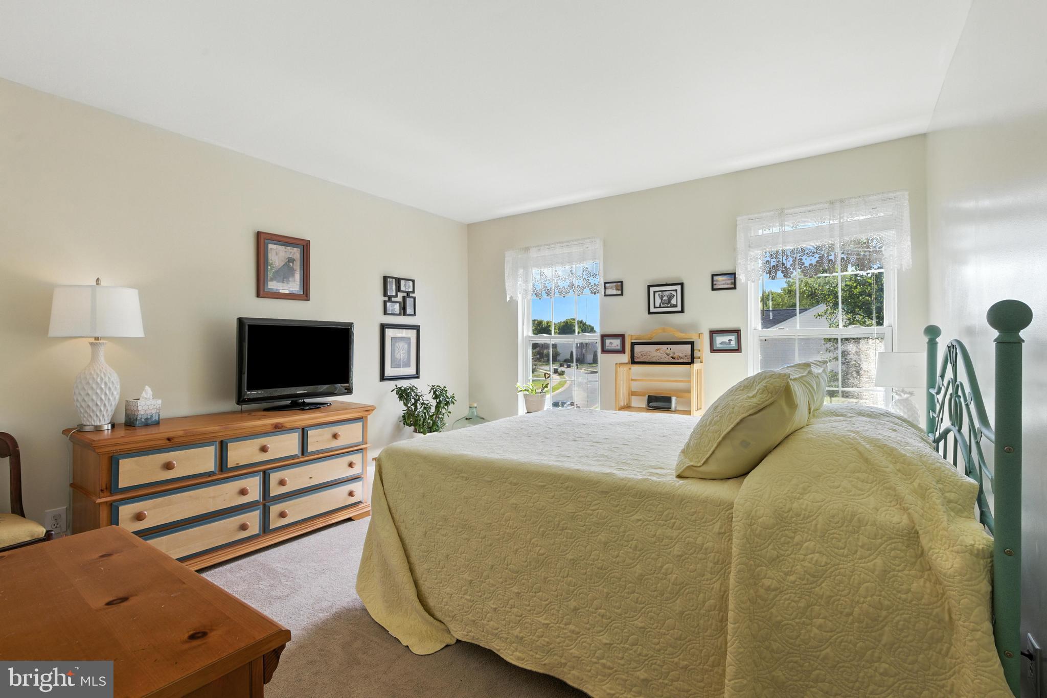 463 Preakness Run Newark, DE 19702 - Photo 20 of 32 a bedroom with furniture and a flat screen tv