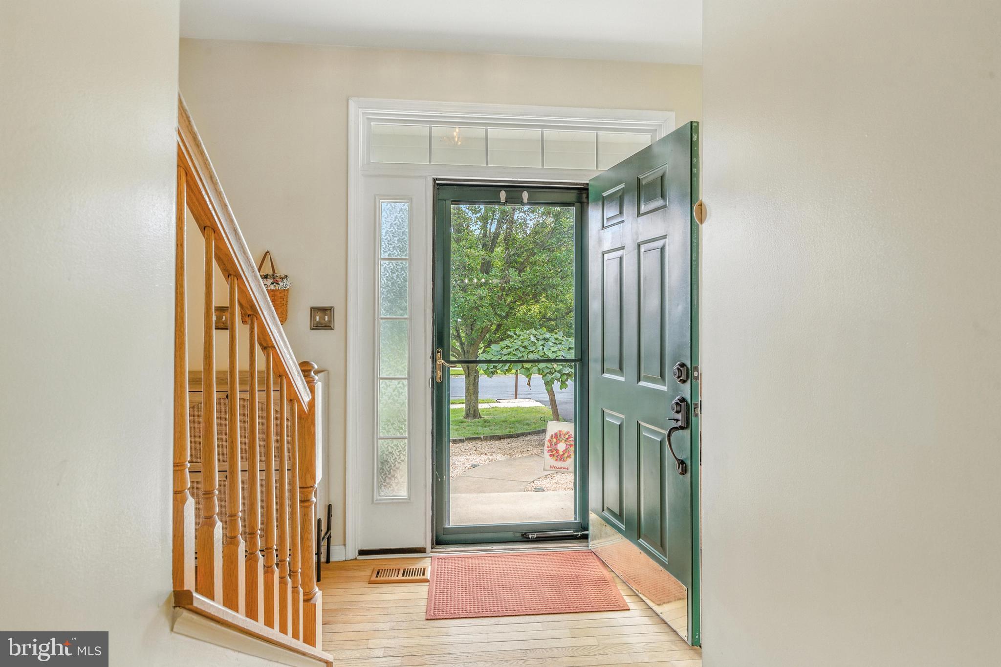463 Preakness Run Newark, DE 19702 - Photo 5 of 32 a view of entryway with wooden floor and door
