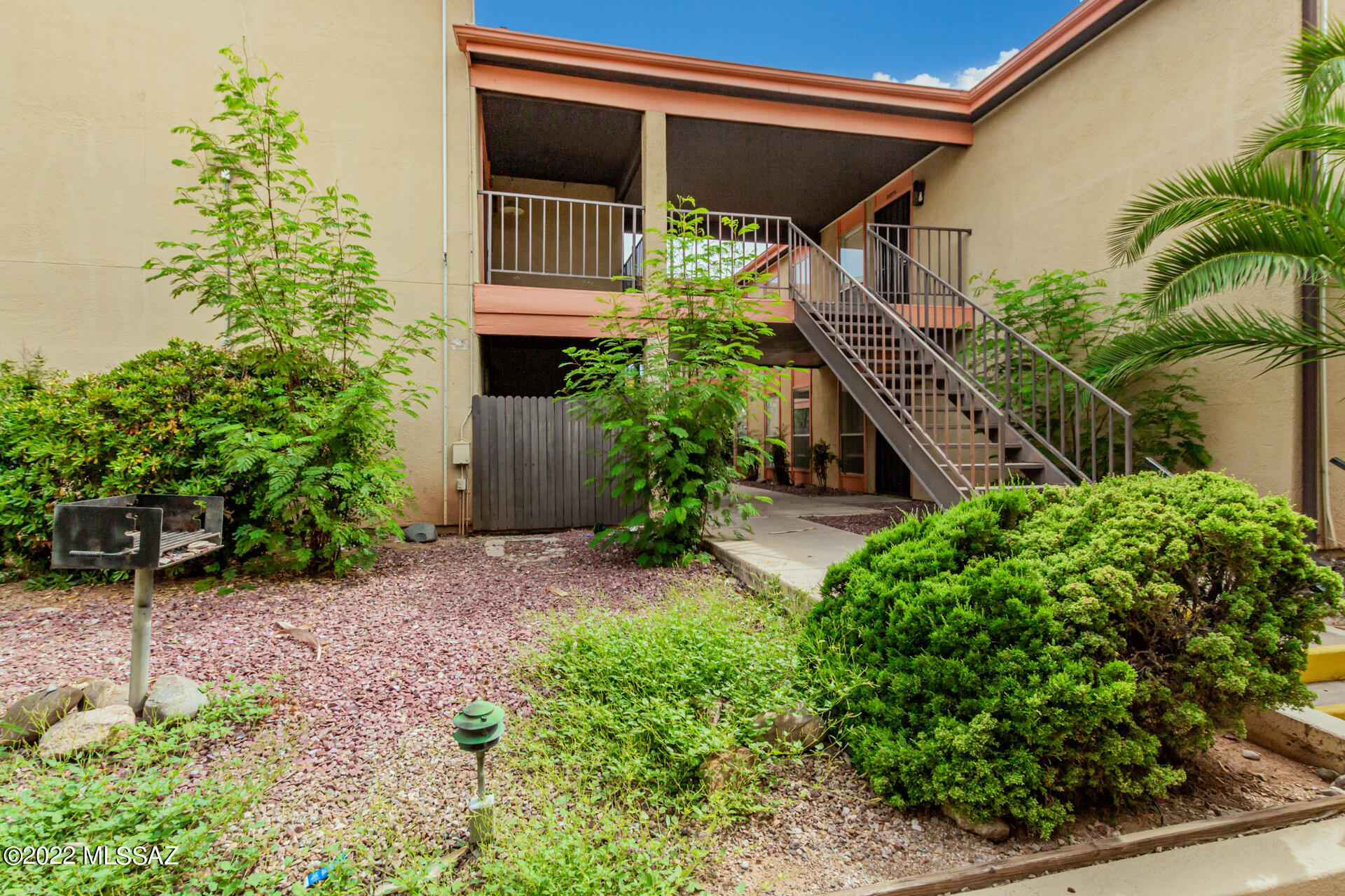 1620 North Wilmot Road, Unit D273 Tucson, AZ 85712 - Photo 15 of 15 a house view with a garden space