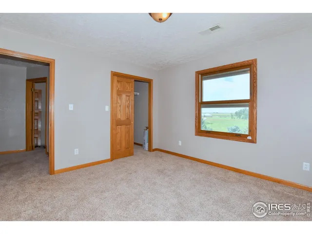 a view of an empty room with window