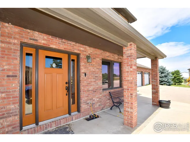 a front view of a house with glass windows