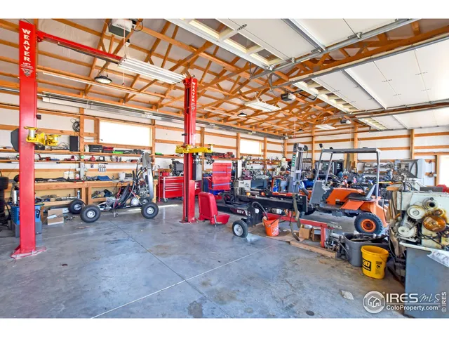 a view of a room with storage and a utility room