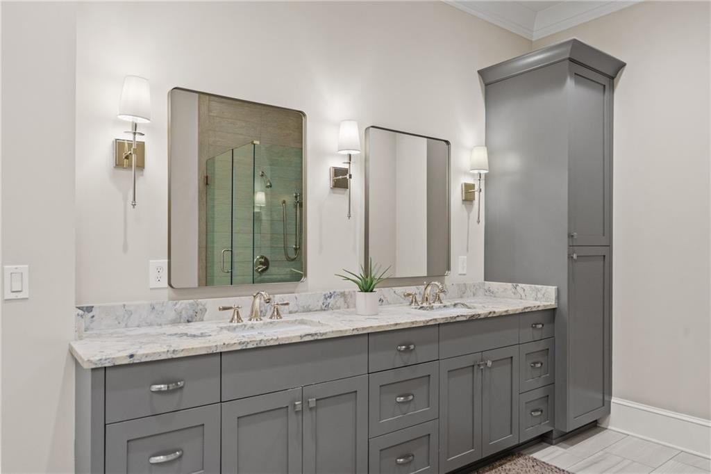 50 Canton Street, Unit 307 Alpharetta, GA 30009 - Photo 24 of 56 a bathroom with double sink and a mirror