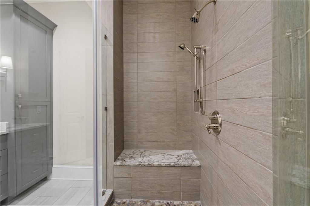 50 Canton Street, Unit 307 Alpharetta, GA 30009 - Photo 25 of 56 a bathroom with a shower