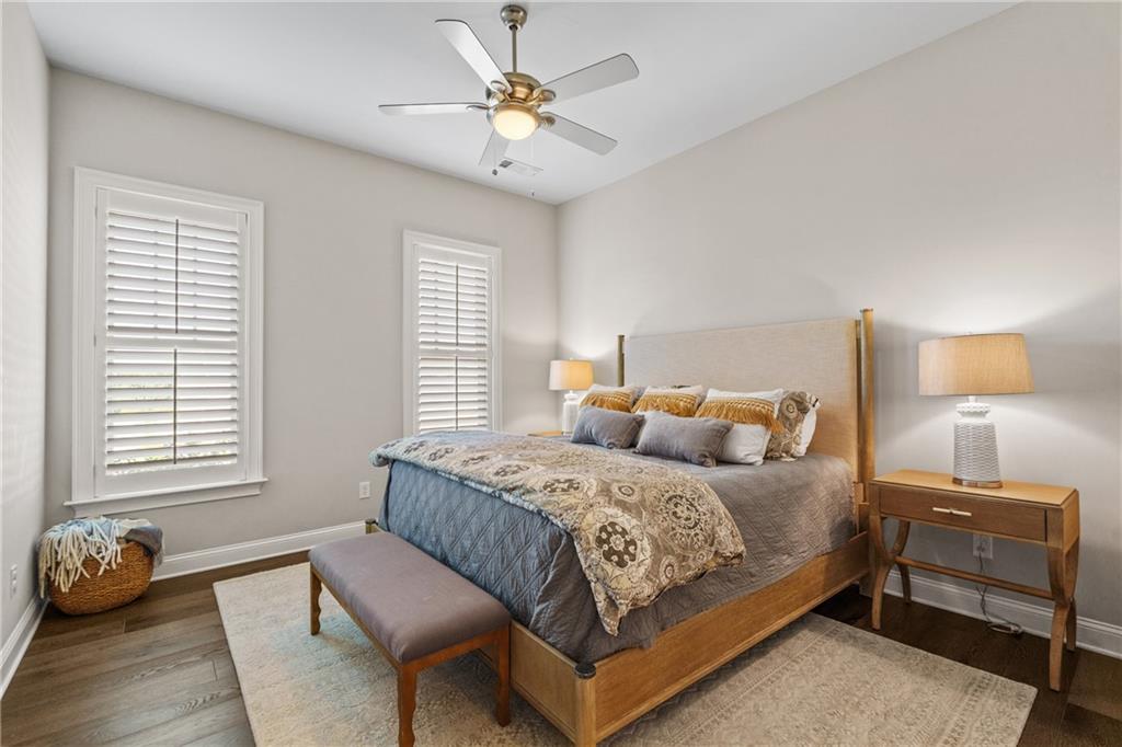 50 Canton Street, Unit 307 Alpharetta, GA 30009 - Photo 27 of 56 a bedroom with a bed and a window