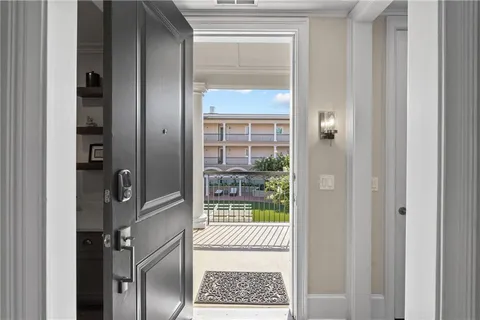 a view of swimming pool with chairs