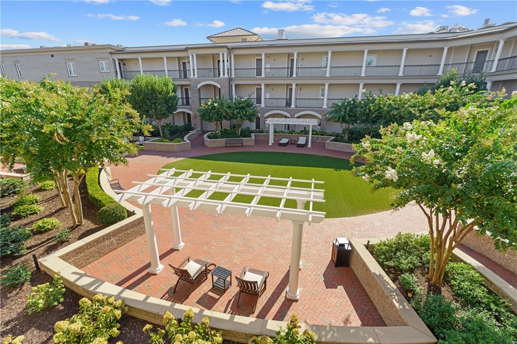 50 Canton Street, Unit 307 Alpharetta, GA 30009 - Photo 33 of 56 a view of an outdoor space with a patio