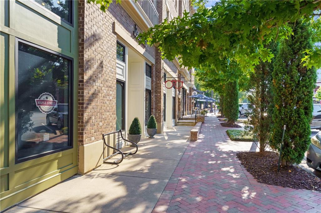 50 Canton Street, Unit 307 Alpharetta, GA 30009 - Photo 42 of 56 a view of a brick buildings with many windows