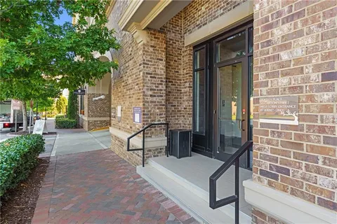 a kitchen with stainless steel appliances granite countertop a stove and a refrigerator