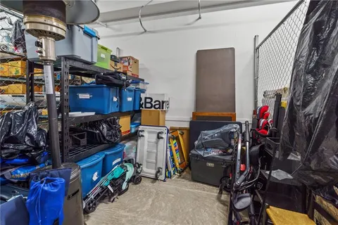 a view of street along with flowers and trees