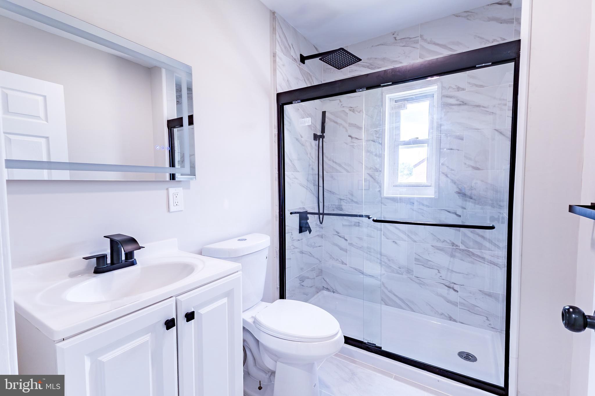 Elliot Avenue Bethlehem, PA 18018 - Photo 24 of 39 a bathroom with a sink toilet and shower