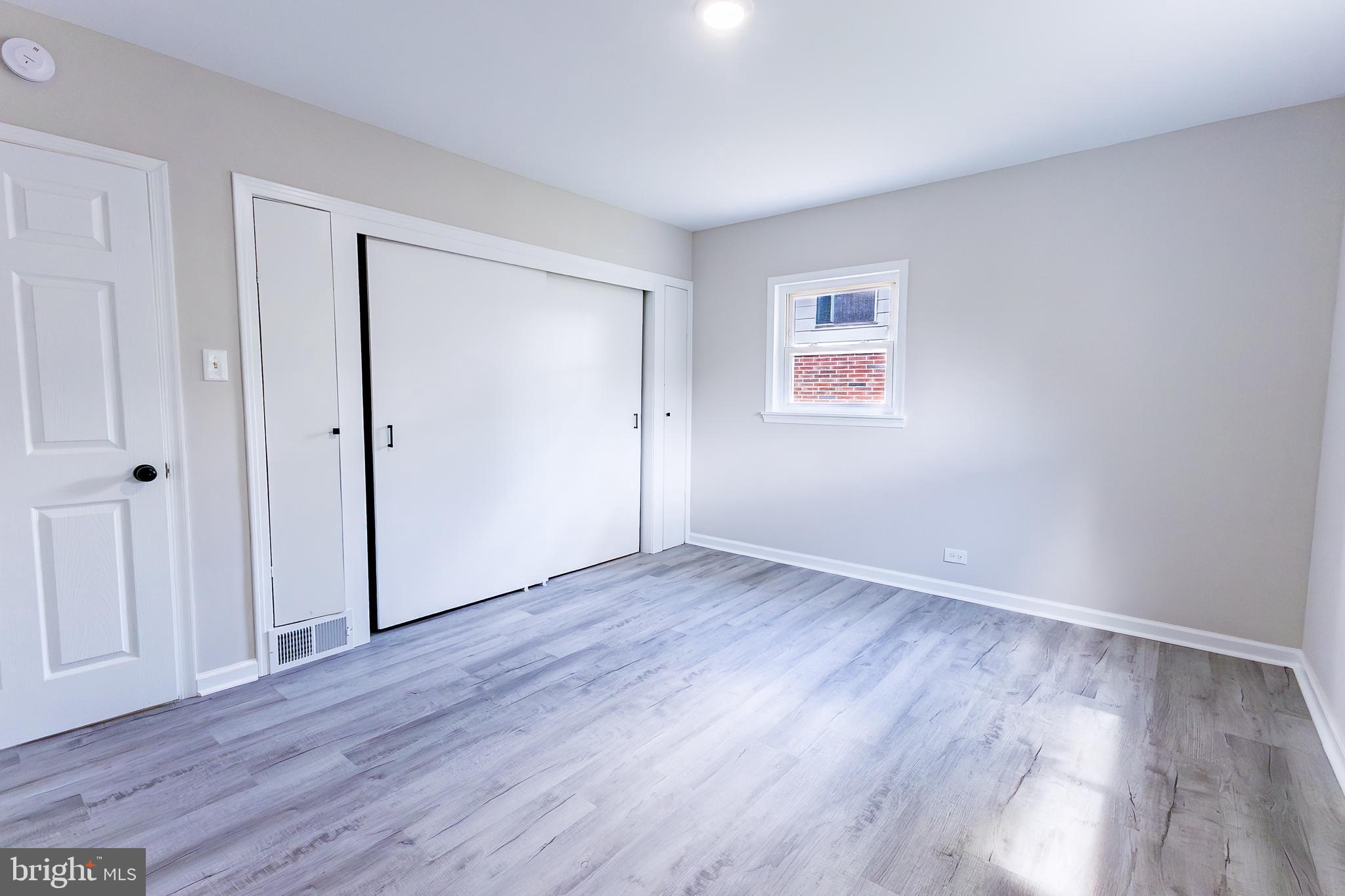 Elliot Avenue Bethlehem, PA 18018 - Photo 28 of 39 a view of an empty room with wooden floor