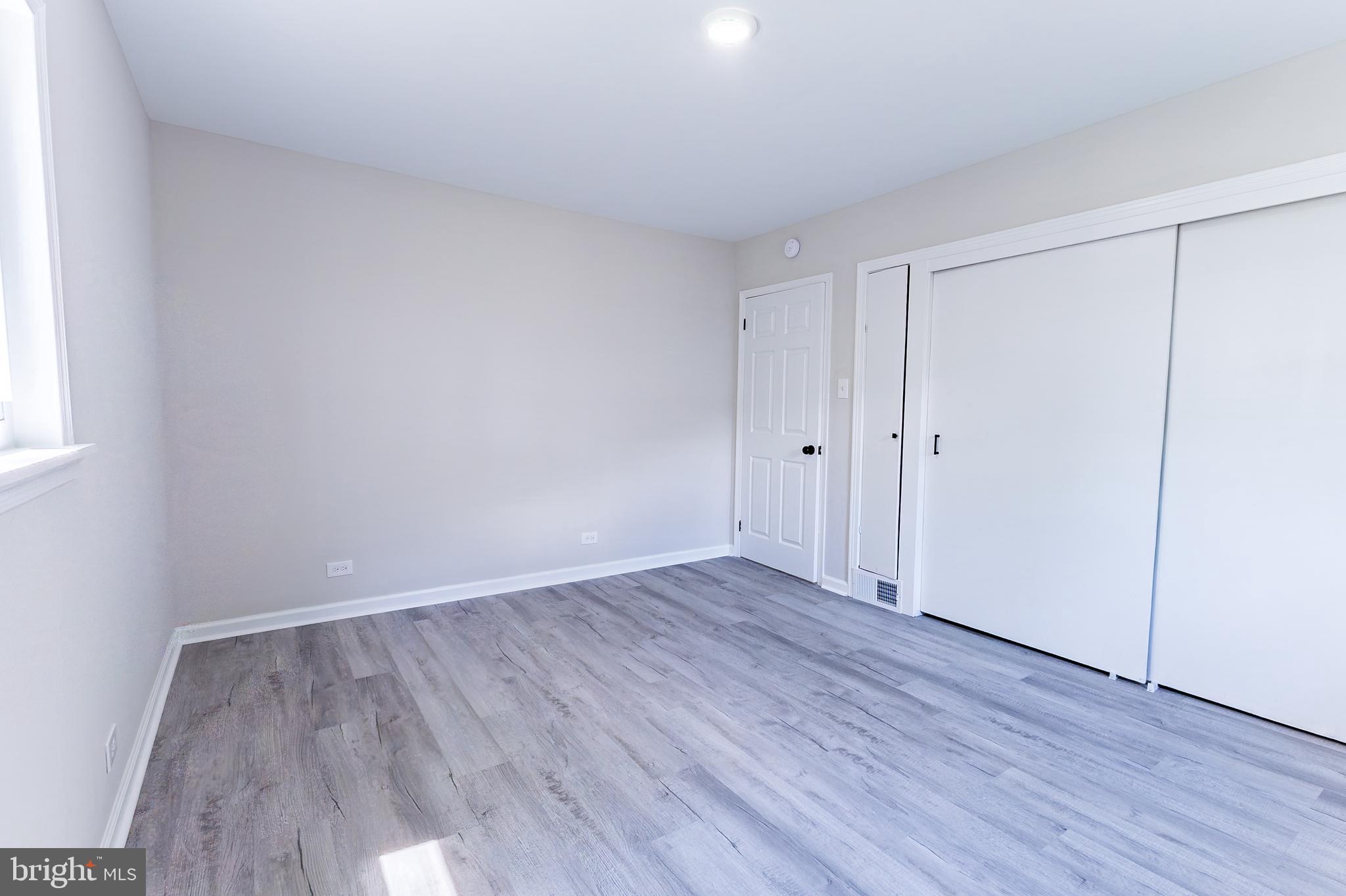 Elliot Avenue Bethlehem, PA 18018 - Photo 29 of 39 a view of an empty room with wooden floor