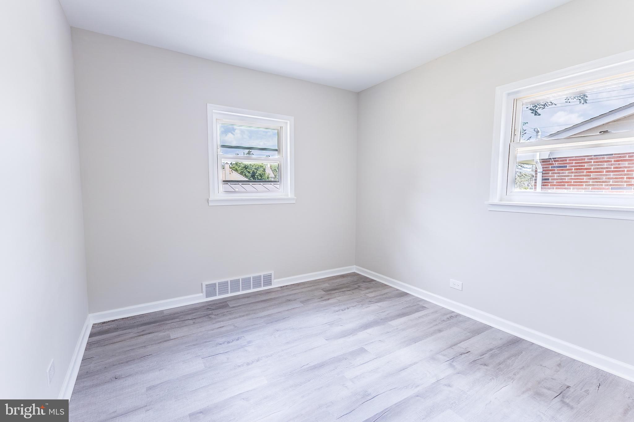 Elliot Avenue Bethlehem, PA 18018 - Photo 32 of 39 an empty room with wooden floor and window