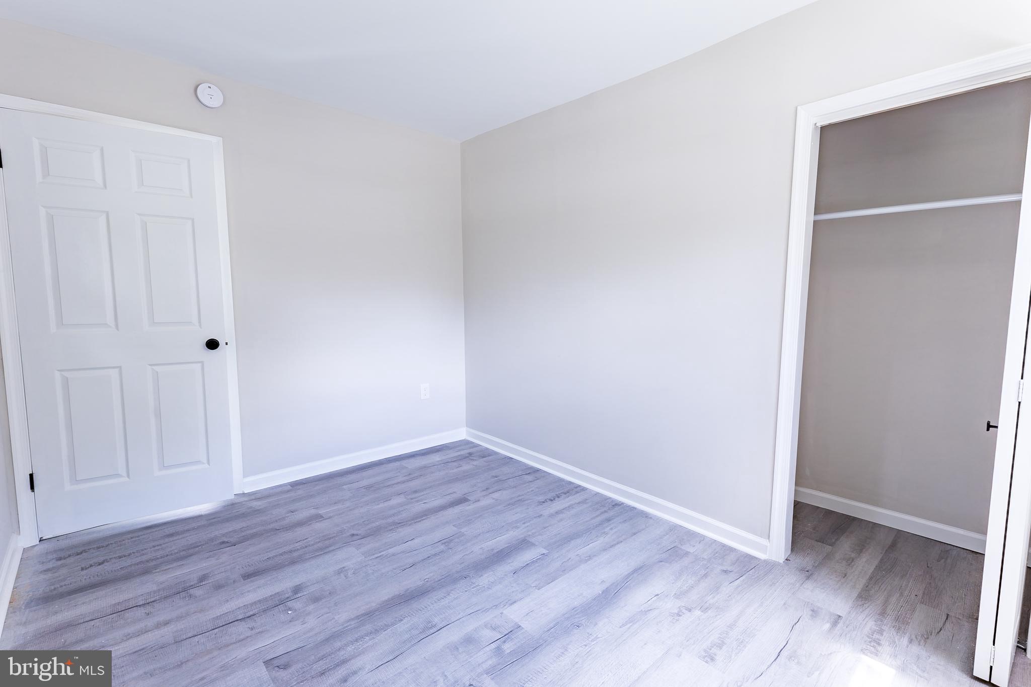 Elliot Avenue Bethlehem, PA 18018 - Photo 33 of 39 a view of an empty room with wooden floor