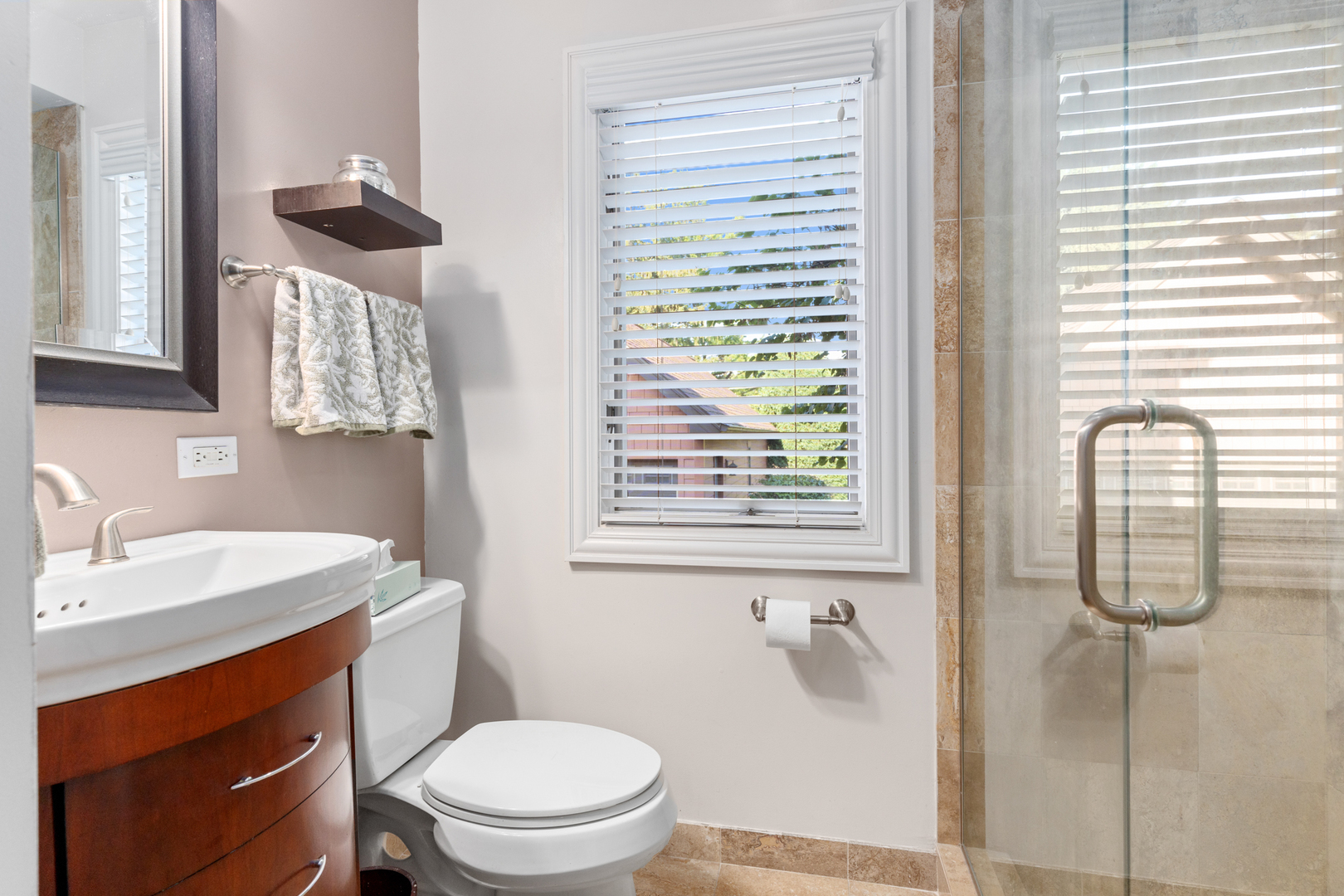 424 Willow Street Itasca, IL 60143 - Photo 14 of 47 a bathroom with a sink a toilet and shower
