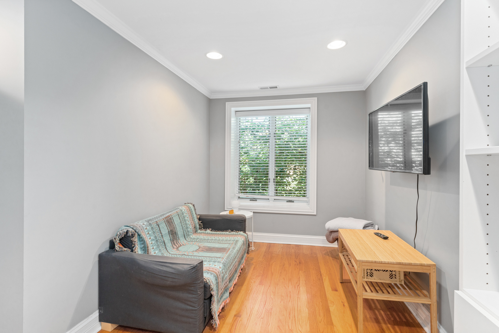 424 Willow Street Itasca, IL 60143 - Photo 21 of 47 a bedroom with a bed and wooden floor