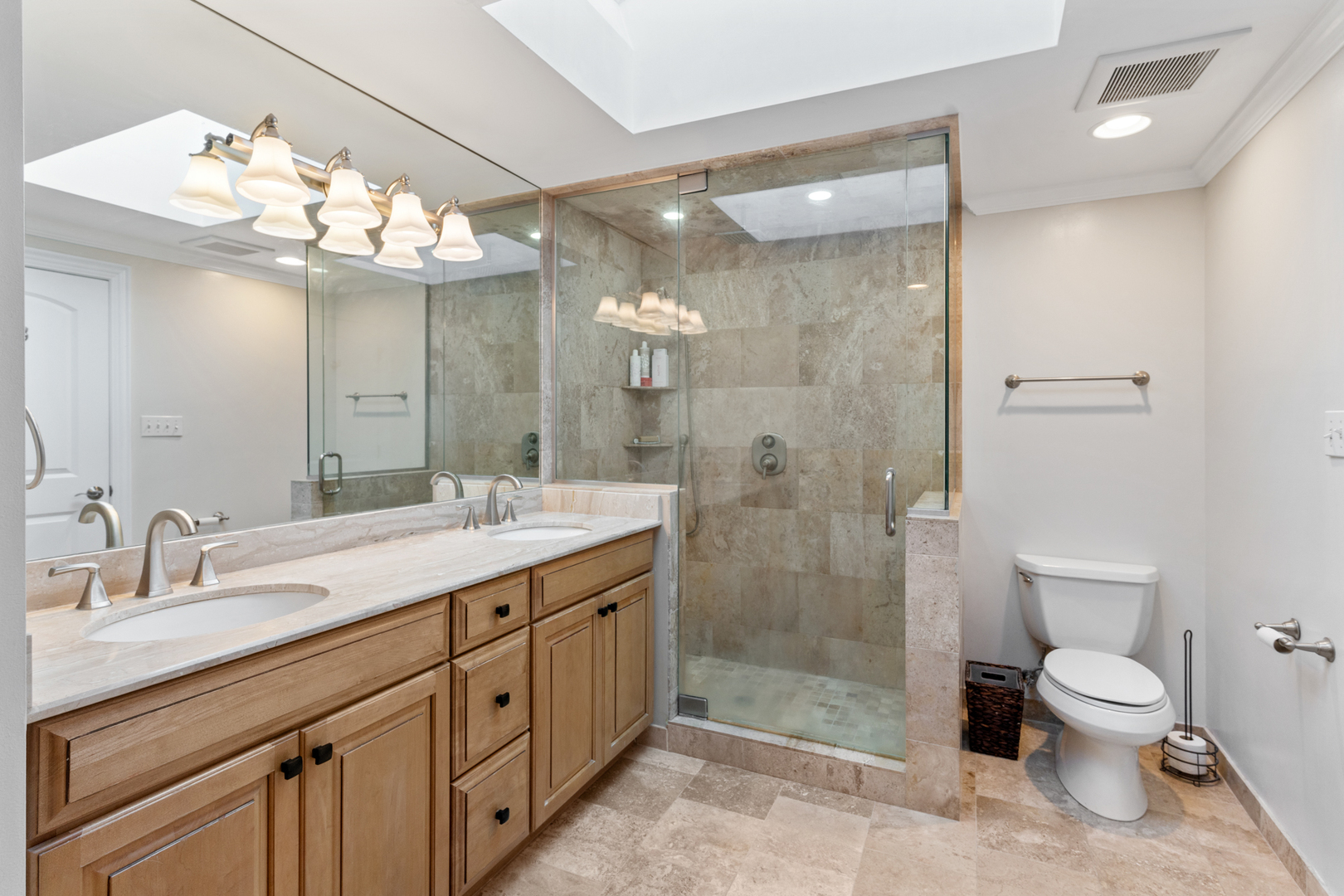 424 Willow Street Itasca, IL 60143 - Photo 23 of 47 a spacious bathroom with a double vanity sink mirror and toilet