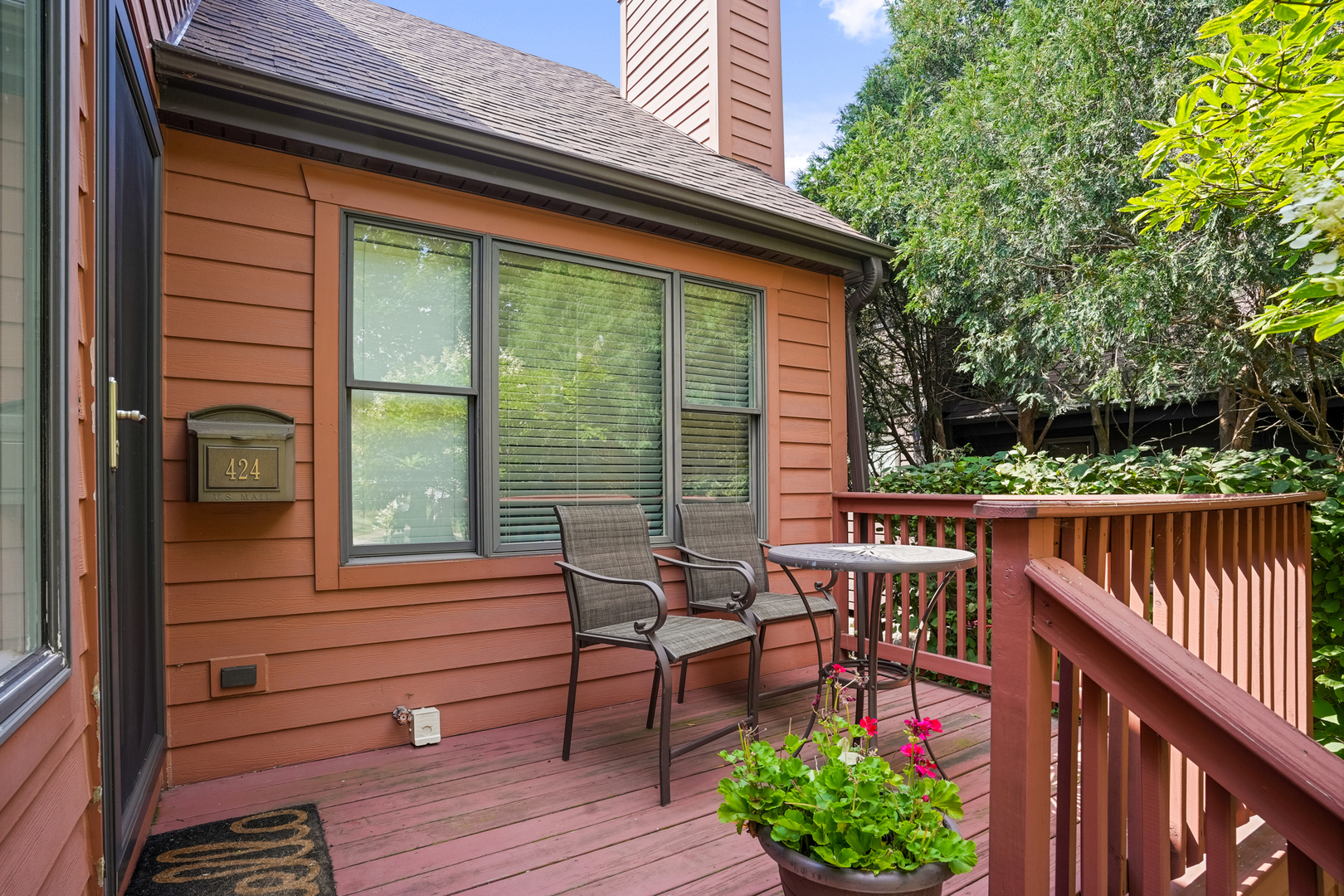 424 Willow Street Itasca, IL 60143 - Photo 33 of 47 a balcony with wooden floor and furniture