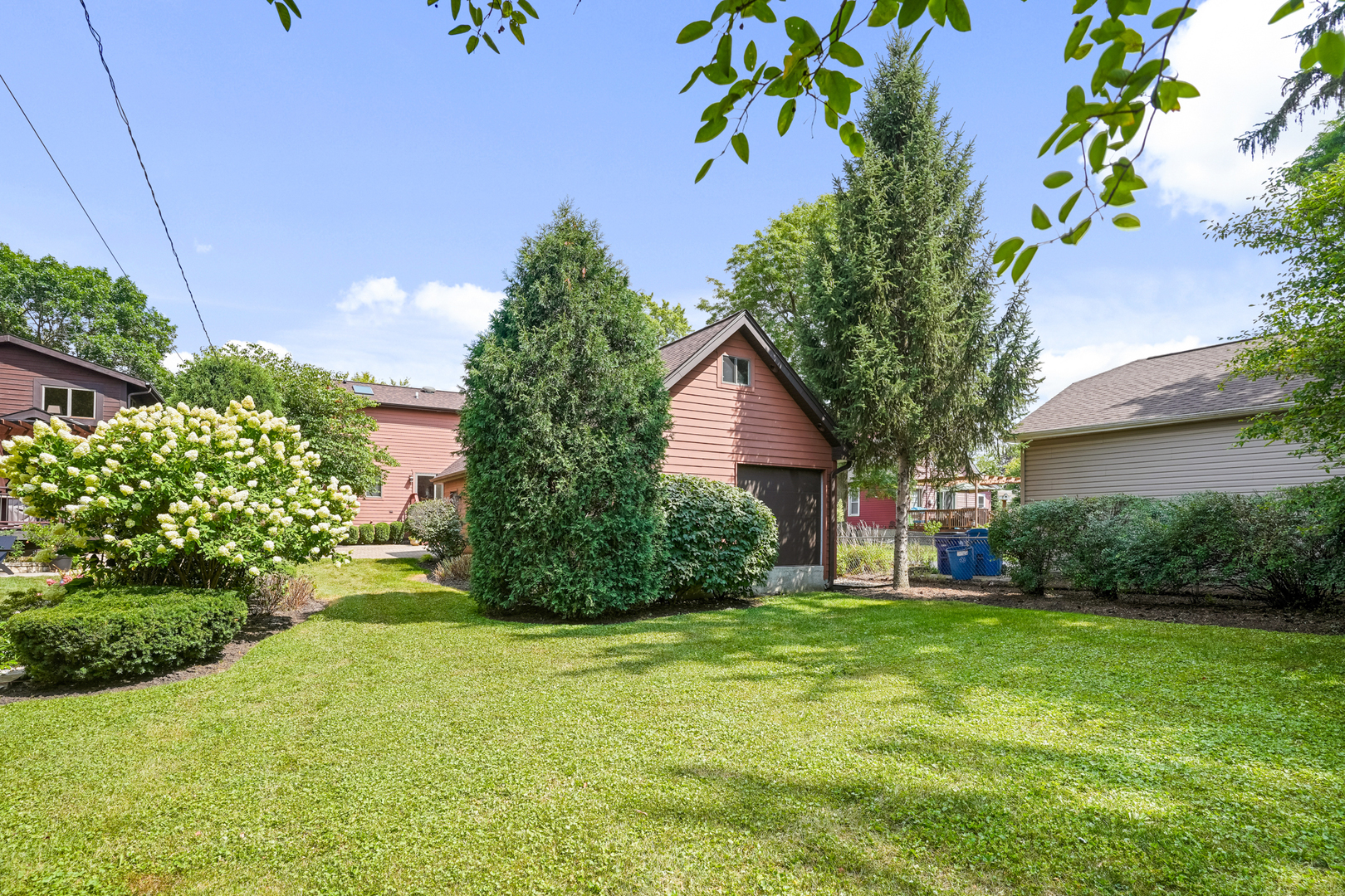424 Willow Street Itasca, IL 60143 - Photo 35 of 47 a front view of a house with a yard