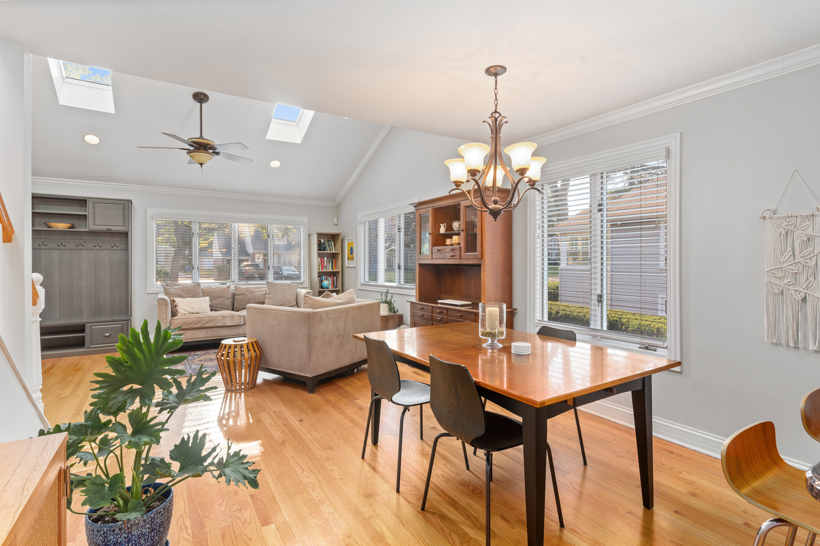 424 Willow Street Itasca, IL 60143 - Photo 8 of 47 a dining room with furniture a chandelier and wooden floor