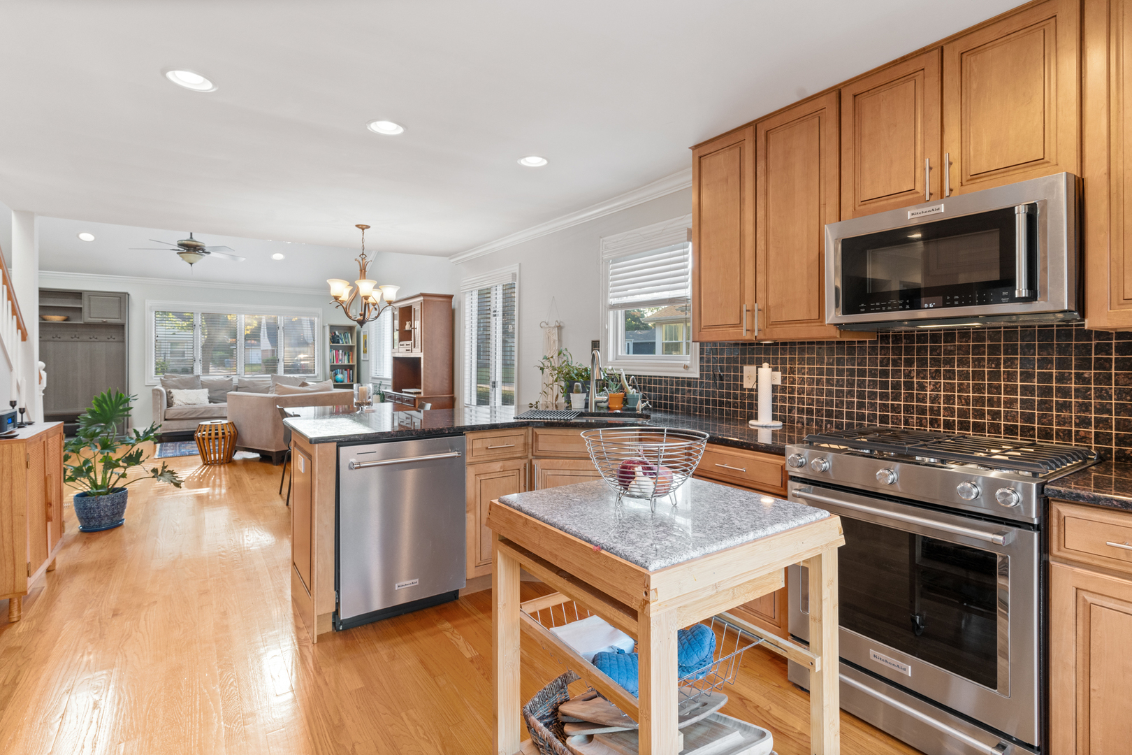 424 Willow Street Itasca, IL 60143 - Photo 10 of 47 a kitchen with a sink stove and cabinets