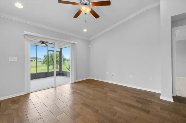 a view of a kitchen with a sink and a window