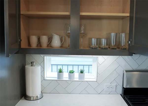 a kitchen with a stove and a microwave