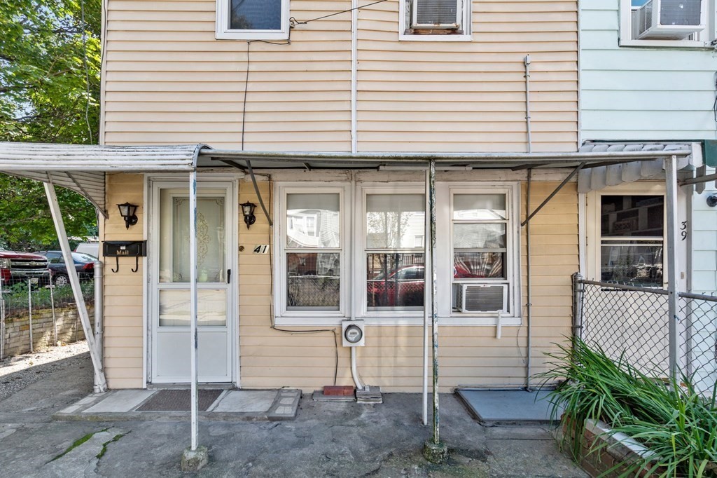 41 Berkeley Street Watertown, MA 02472 - Photo 2 of 14 a view of a house with a porch