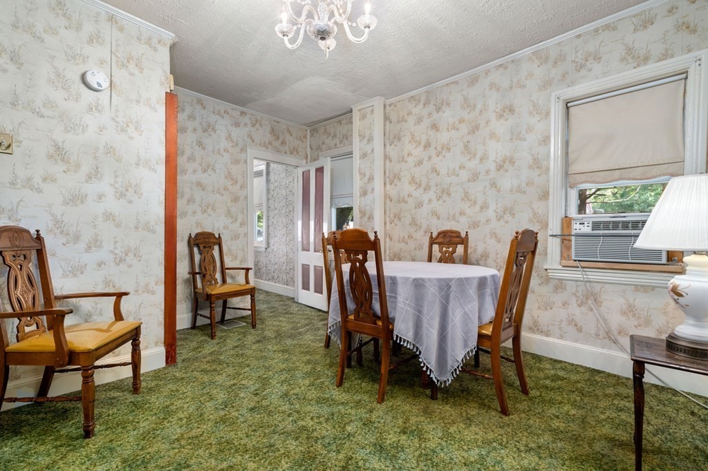 41 Berkeley Street Watertown, MA 02472 - Photo 7 of 14 a view of a dining room with furniture window and outside view