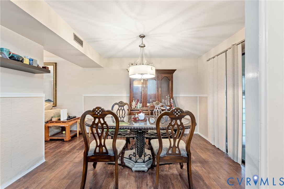 10709 Solaris Court Chesterfield, VA 23832 - Photo 13 of 34 a view of a dining room with furniture window and wooden floor