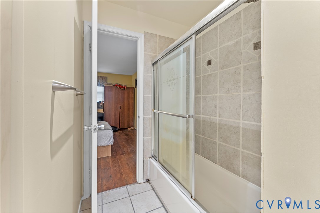 10709 Solaris Court Chesterfield, VA 23832 - Photo 20 of 34 a bathroom with a bathtub and a shower