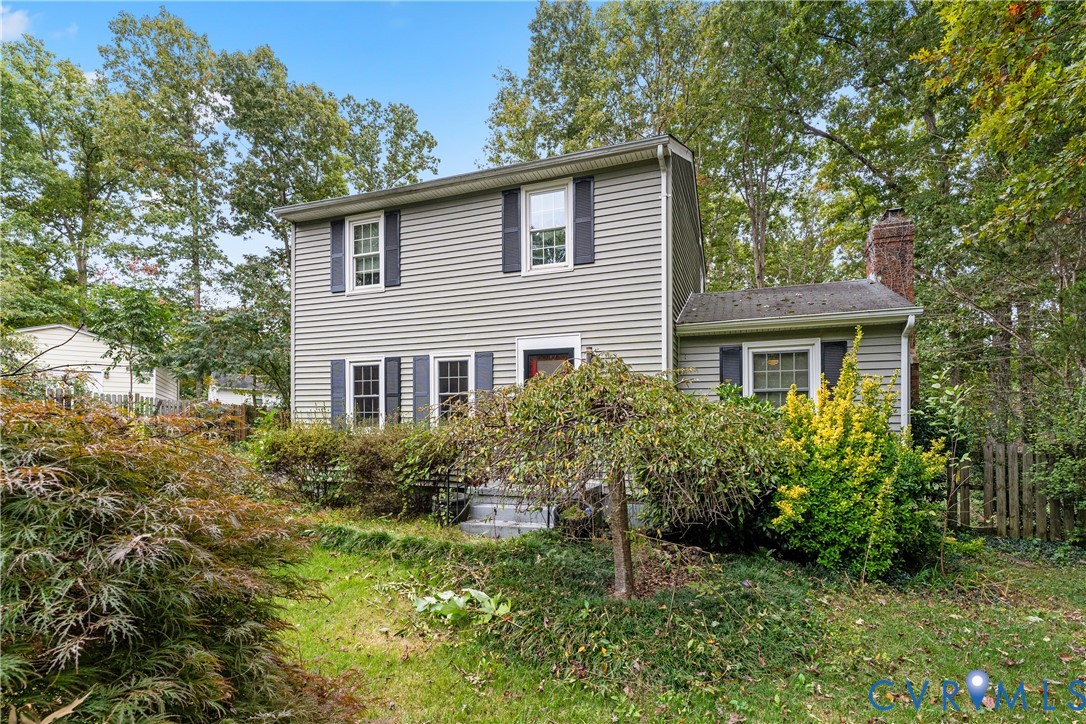 10709 Solaris Court Chesterfield, VA 23832 - Photo 2 of 34 a front view of house with yard and green space