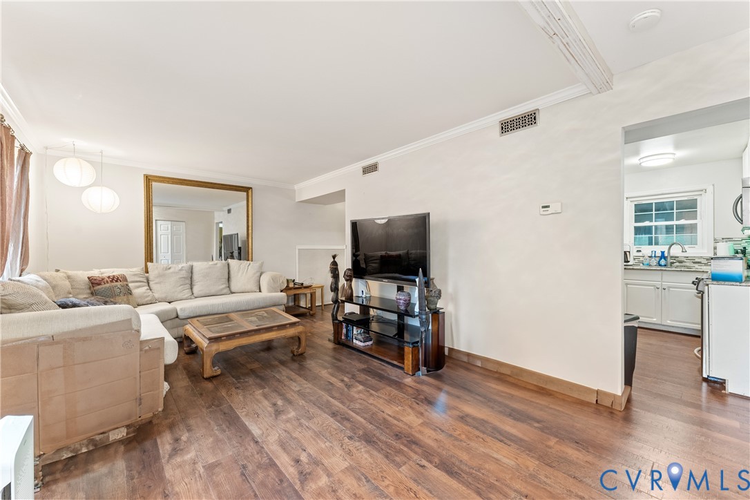 10709 Solaris Court Chesterfield, VA 23832 - Photo 3 of 34 a living room with furniture and a flat screen tv