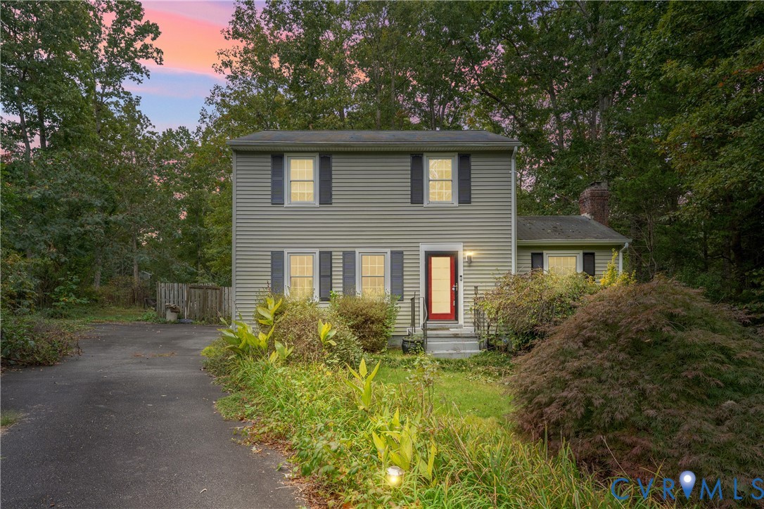 10709 Solaris Court Chesterfield, VA 23832 - Photo 34 of 34 a front view of a house with garden