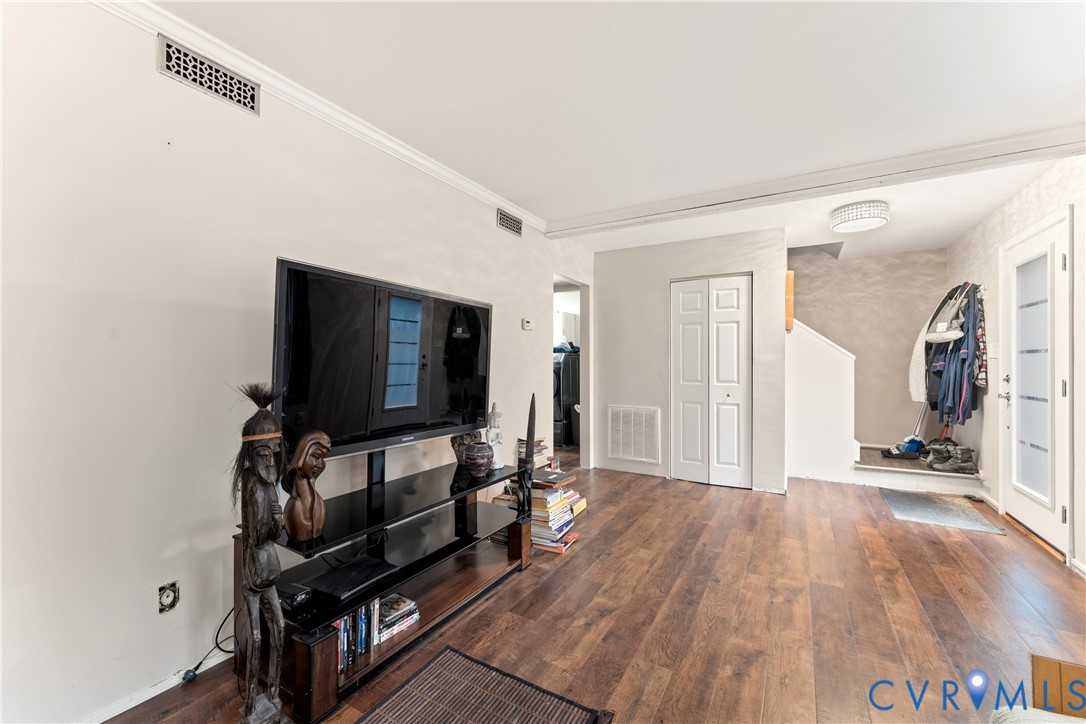 10709 Solaris Court Chesterfield, VA 23832 - Photo 6 of 34 a living room with furniture and a flat screen tv