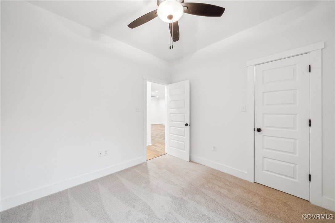 2467 Judes Ferry Road Powhatan, VA 23139 - Photo 15 of 36 wooden floor in an empty room