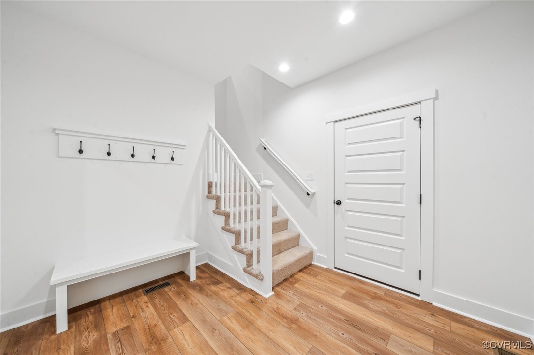 2467 Judes Ferry Road Powhatan, VA 23139 - Photo 18 of 36 a view of a hallway with staircase