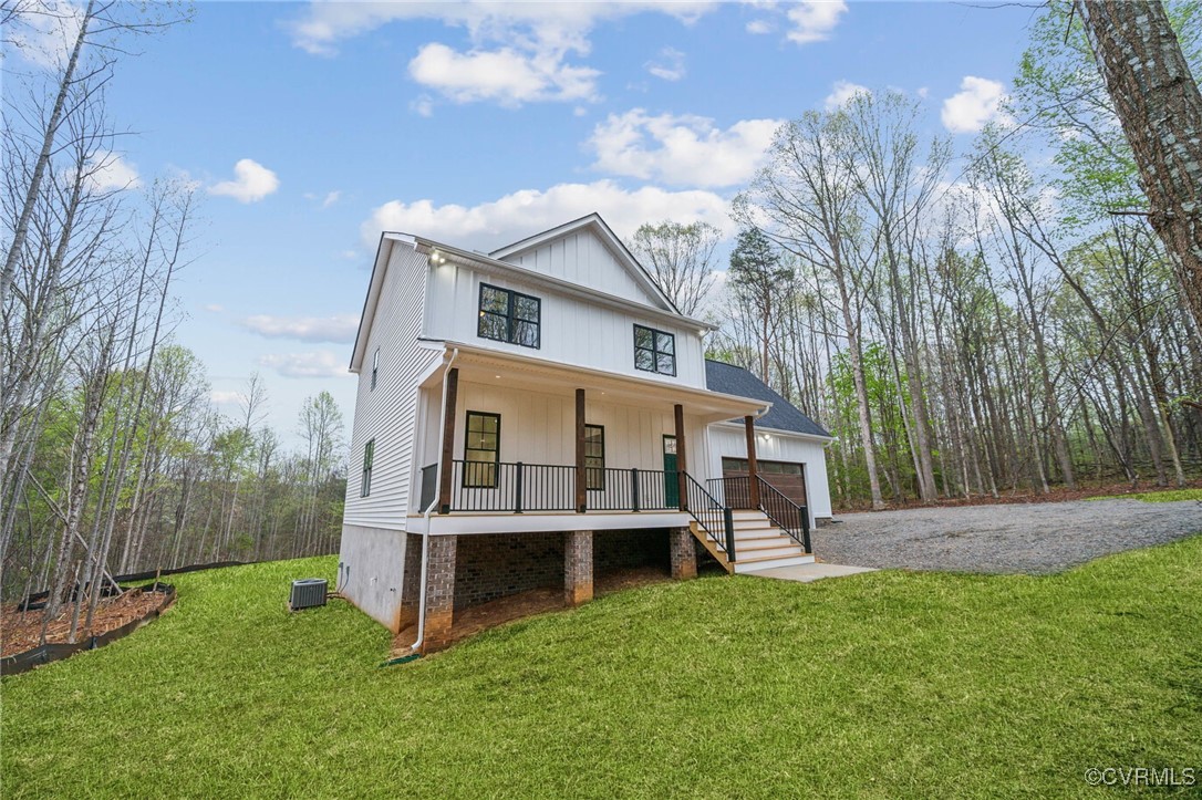 2467 Judes Ferry Road Powhatan, VA 23139 - Photo 2 of 36 a view of a house with a yard and sitting area