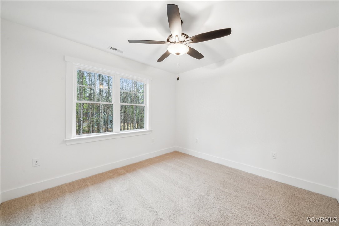 2467 Judes Ferry Road Powhatan, VA 23139 - Photo 25 of 36 a view of an empty room with a window