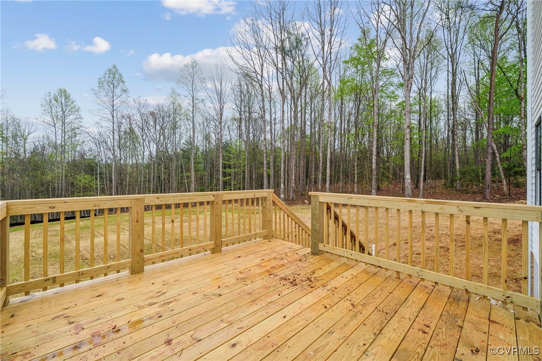 2467 Judes Ferry Road Powhatan, VA 23139 - Photo 34 of 36 a view of balcony with wooden floor and fence